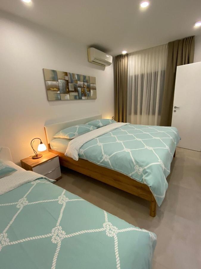 Apartmani Dorijana เวอร์ซาร์ ภายนอก รูปภาพ