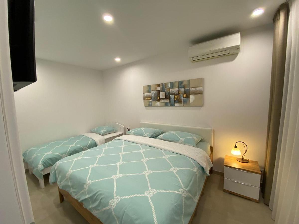 Apartmani Dorijana เวอร์ซาร์ ภายนอก รูปภาพ